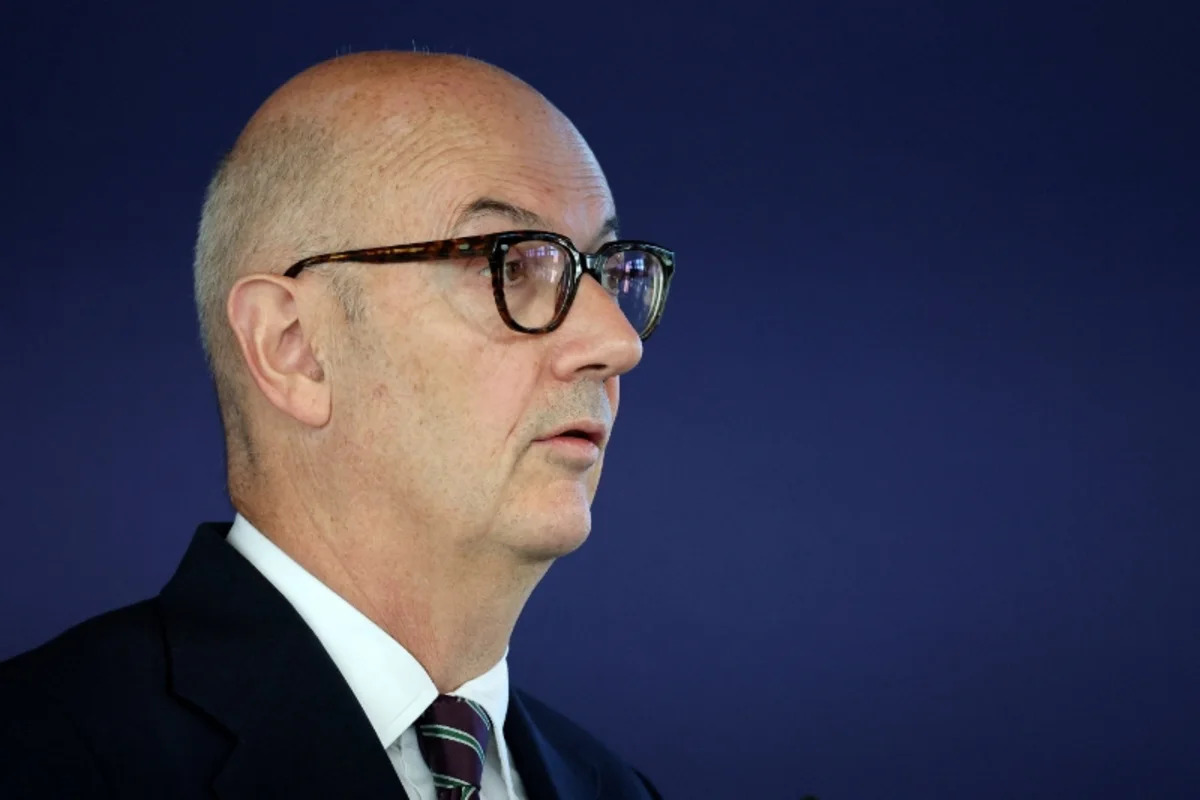 France lowers growth forecast, will miss deficit target